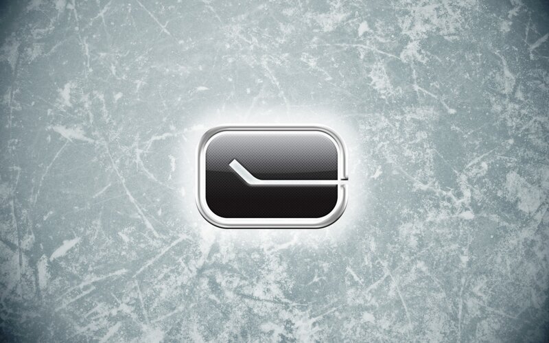 hockey puck logo on ice