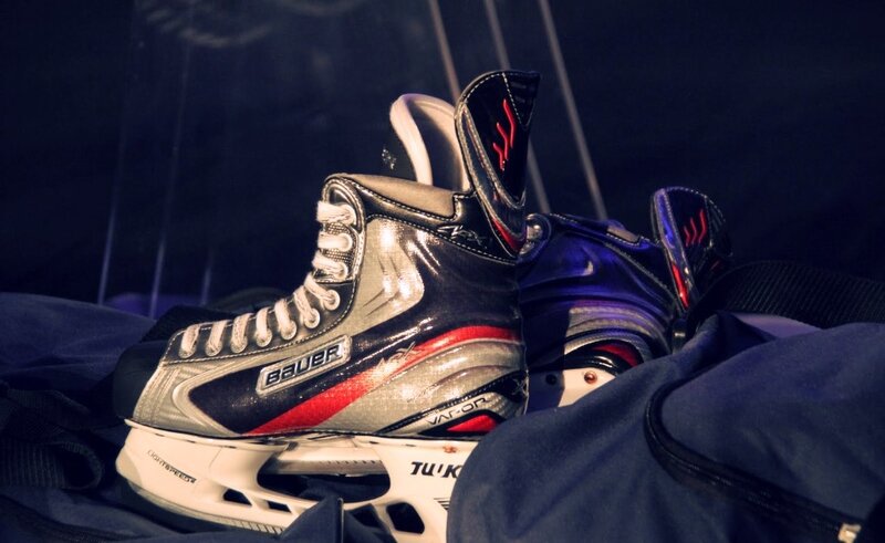 Hockey skates on a bag