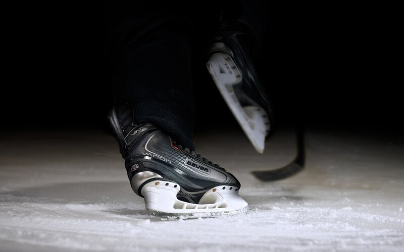 Hockey Skates on Ice — White
