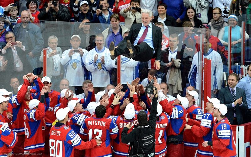 Hockey team celebrates with official