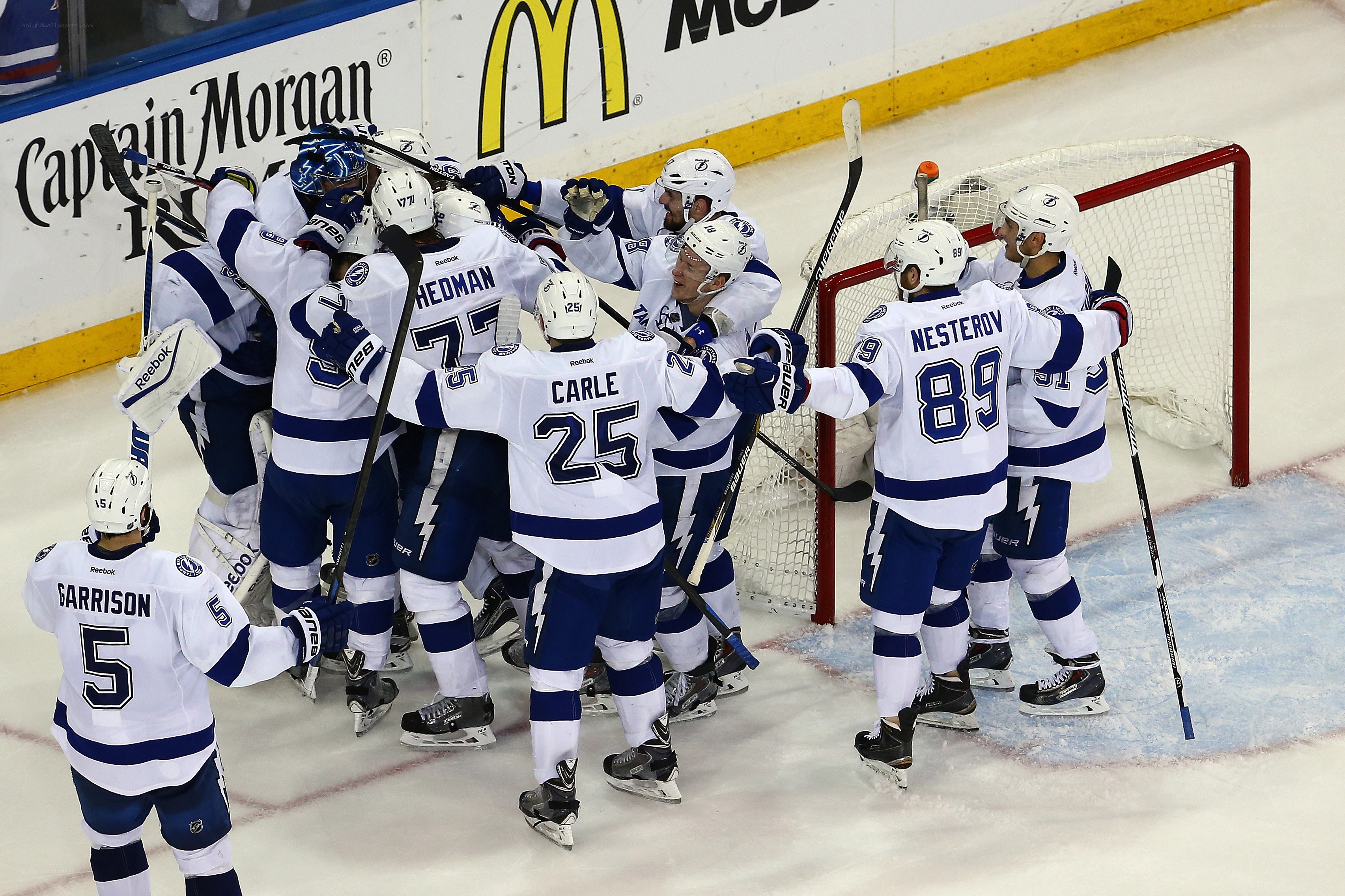 hockey team celebrating goal