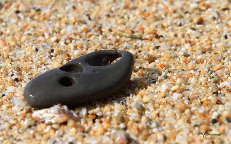 Holey Stone on Sand