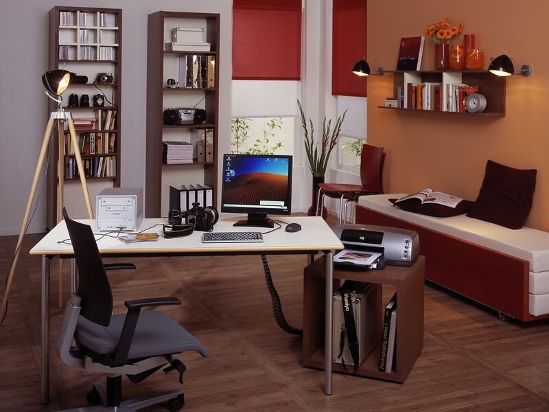 Home office with desk and shelves