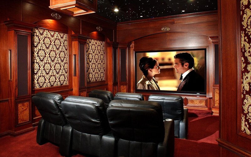 home theater room with leather seats