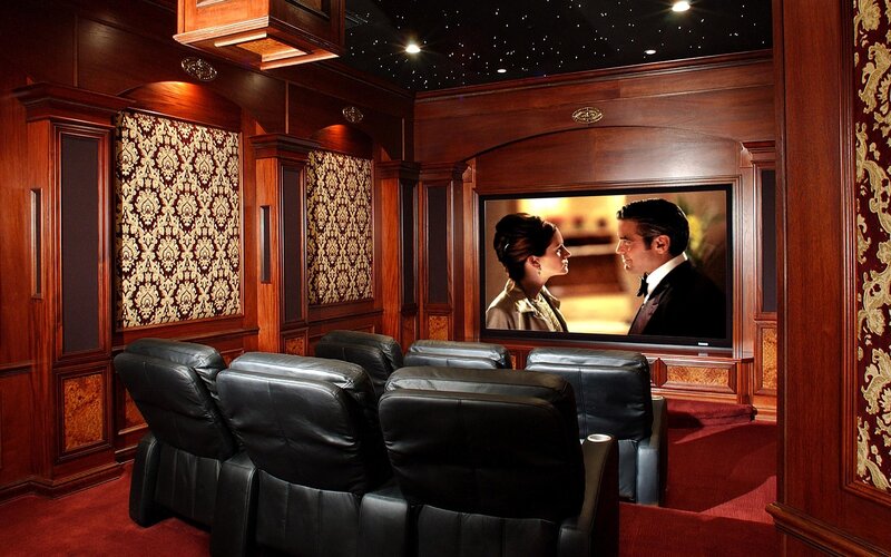 home theater room with leather seats