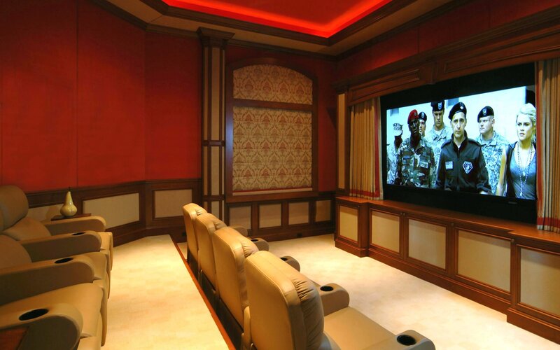 Home theater room with movie playing