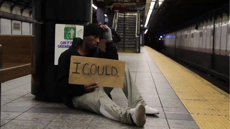 Homeless man at subway station