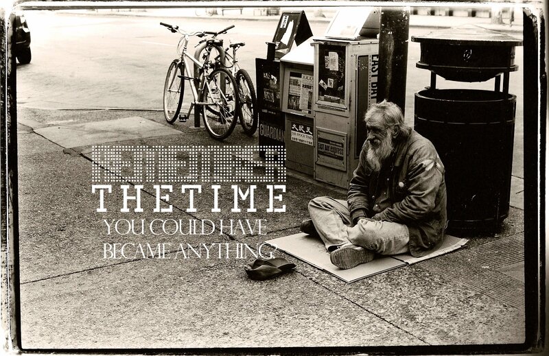 Homeless man on sidewalk