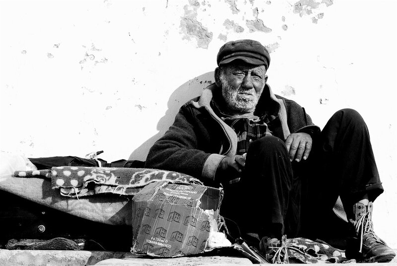 Homeless Man Sitting