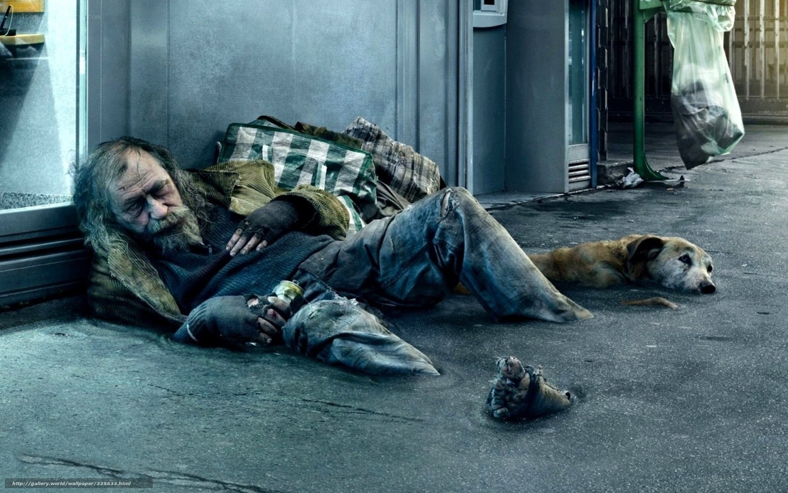 Homeless man sleeping on street