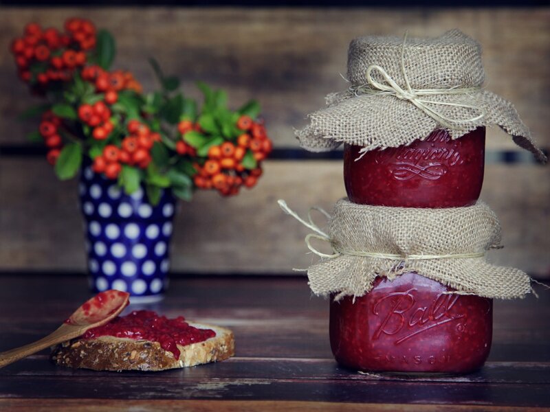 Homemade jam on rustic table