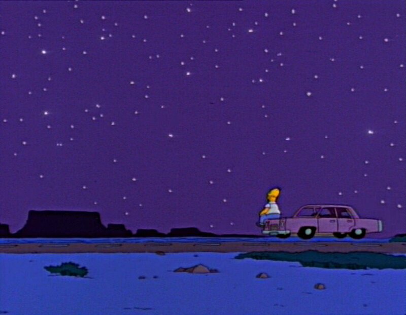 Homer on a car at night