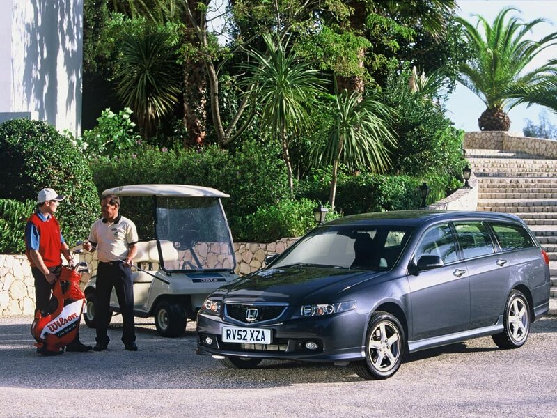 Honda Accord Touring on a golf course