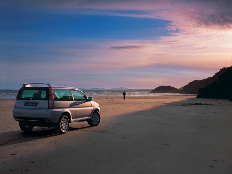 Honda HR-V on a beach at sunset