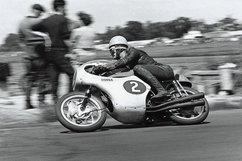 Honda motorcycle racer in action
