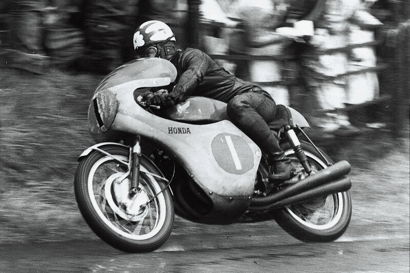 Honda motorcycle racer in action