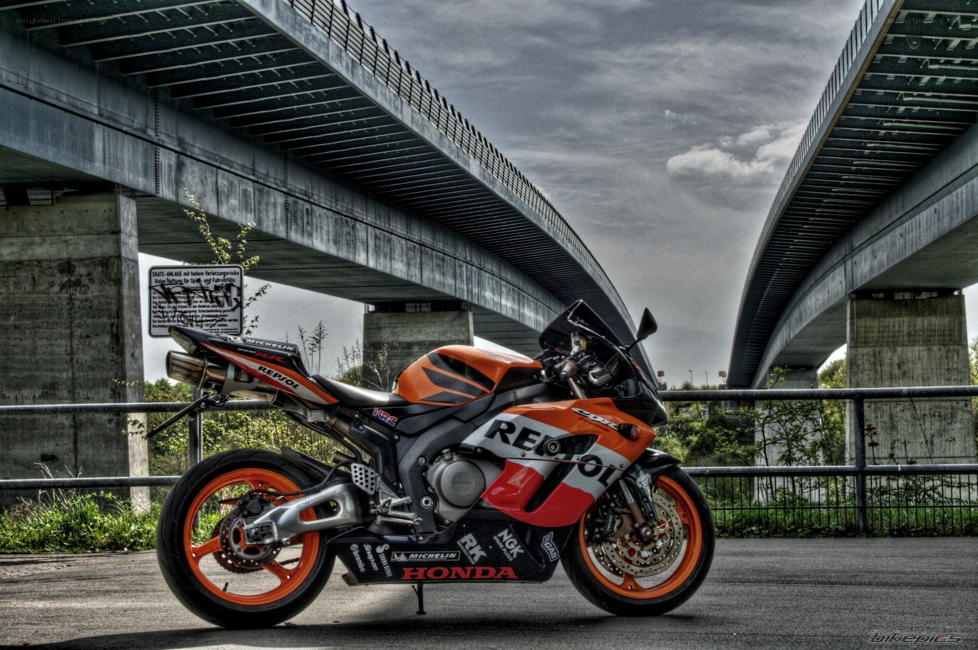Honda motorcycle under bridge