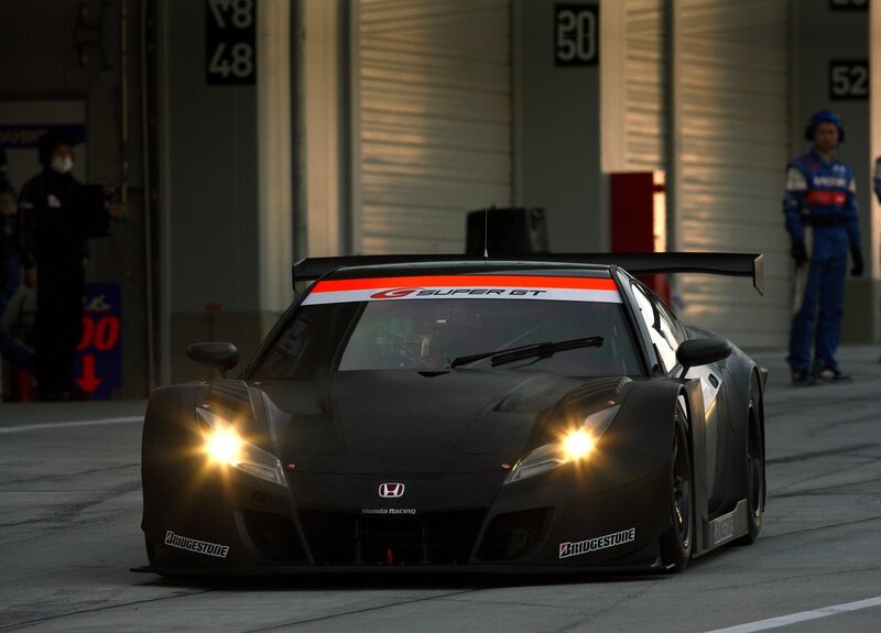Honda race car in pit lane