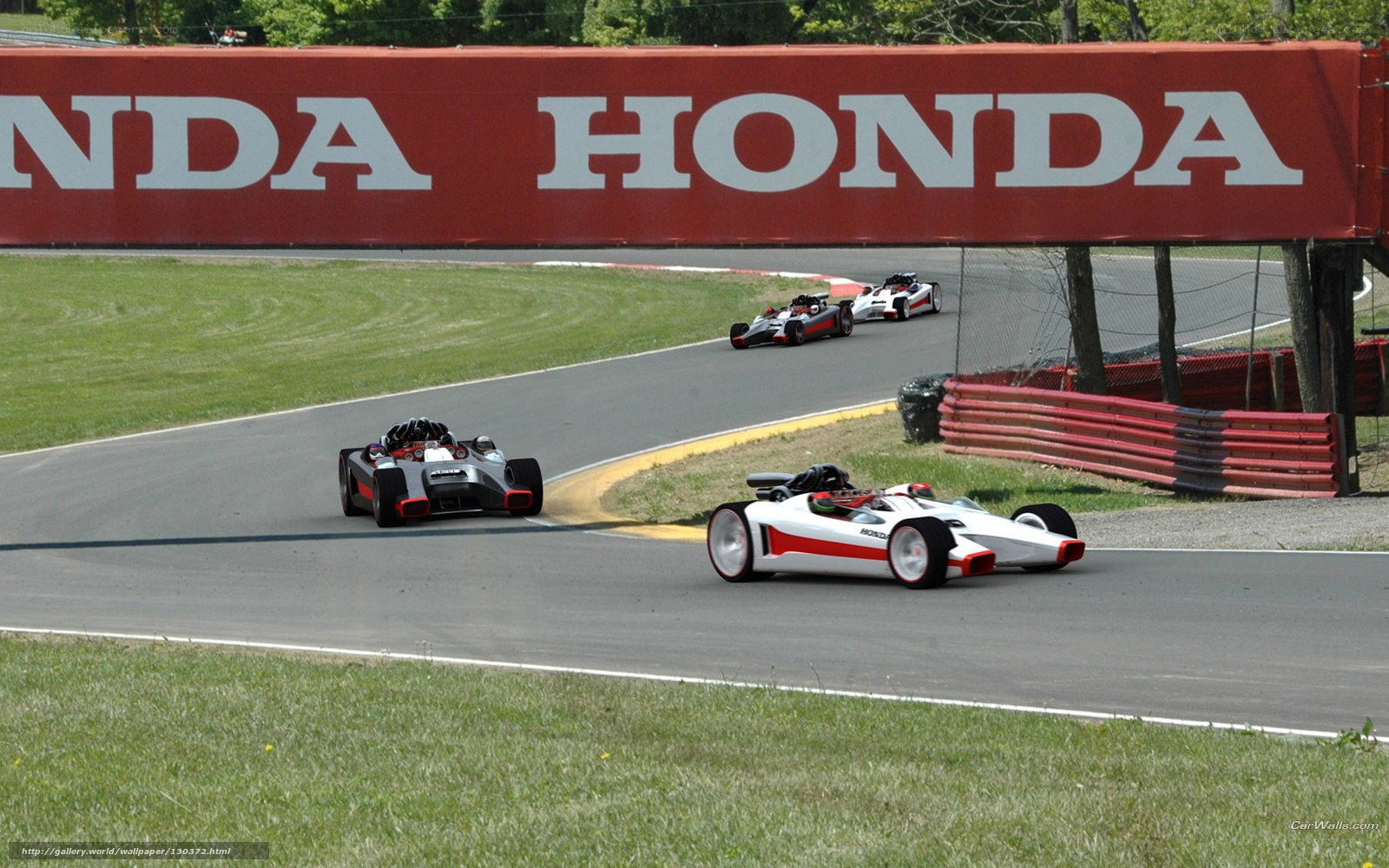 Honda race cars on track