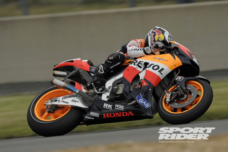 Honda racing motorcycle on track