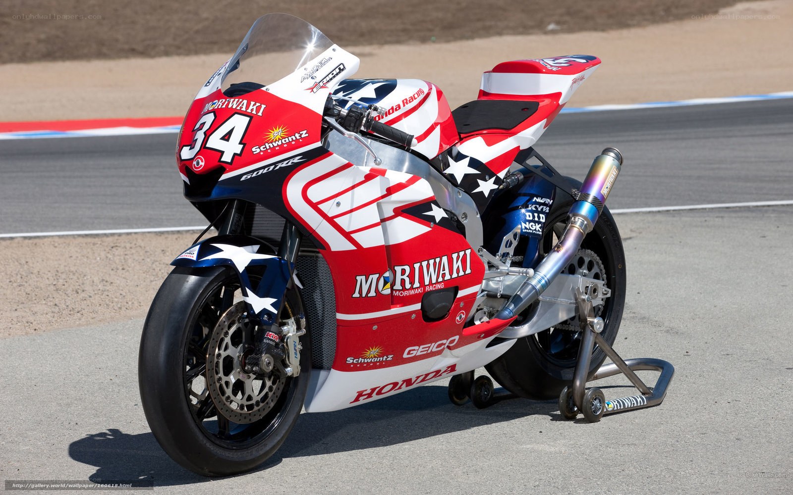Honda racing motorcycle on track
