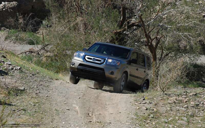 Honda SUV on dirt road
