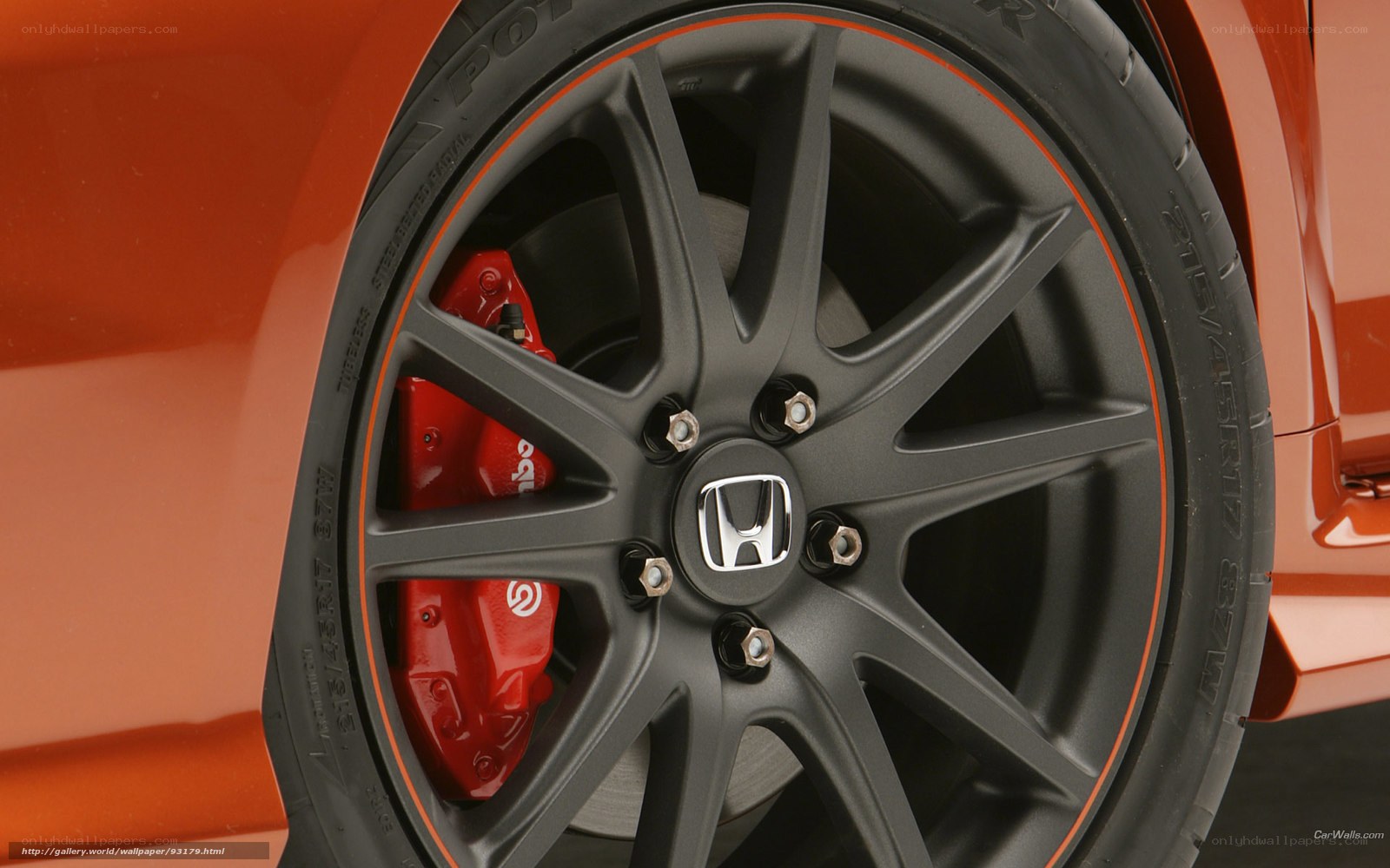 Honda wheel with red brake calipers