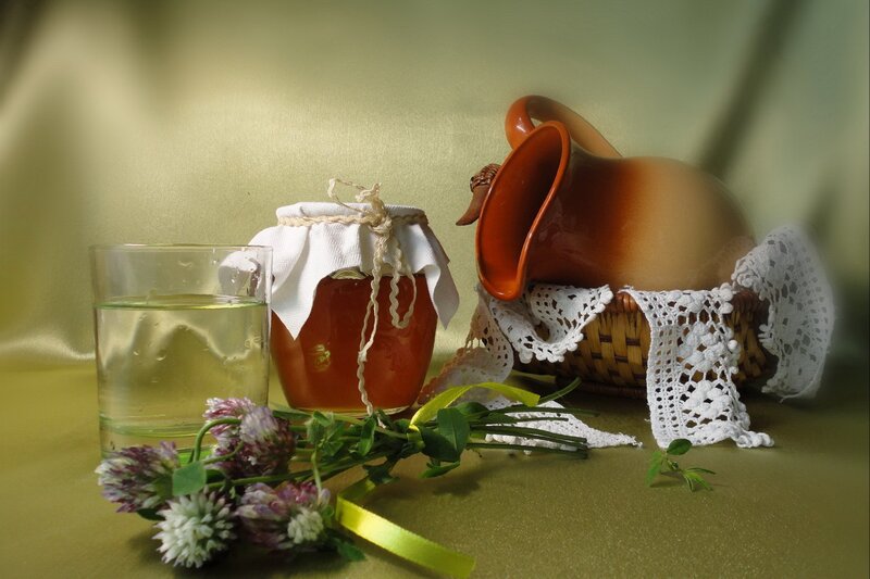 Honey and flowers still life