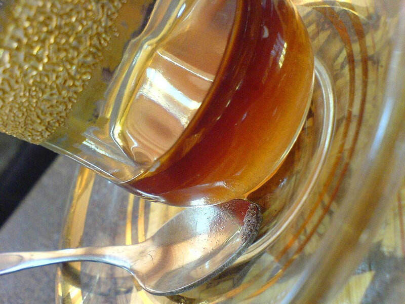 Honey Being Poured — Brown