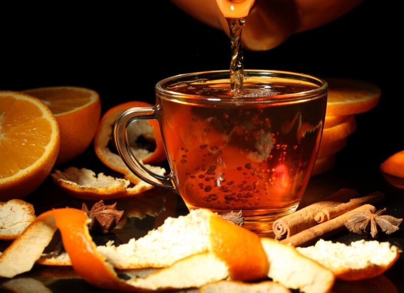 Honey Being Poured into Tea — Brown