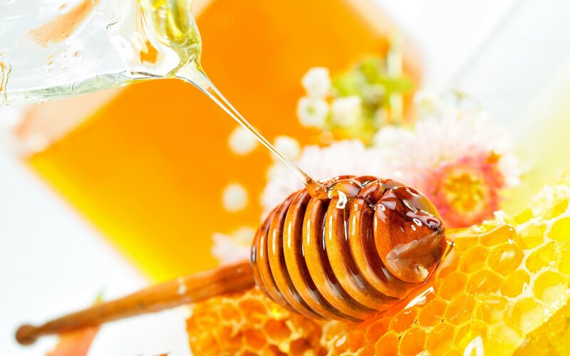 Honey Being Poured — Yellow