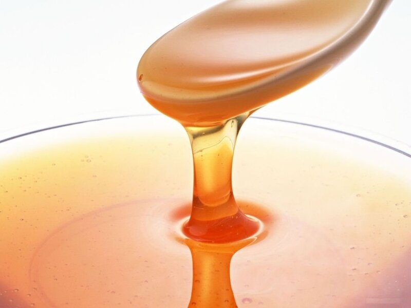 Honey Dripping from Spoon
