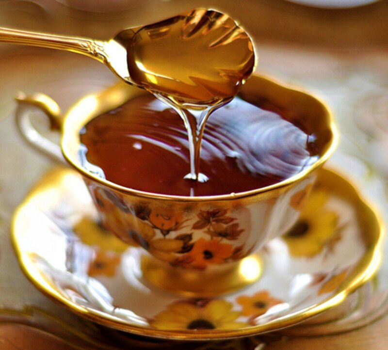 Honey Dripping into Tea