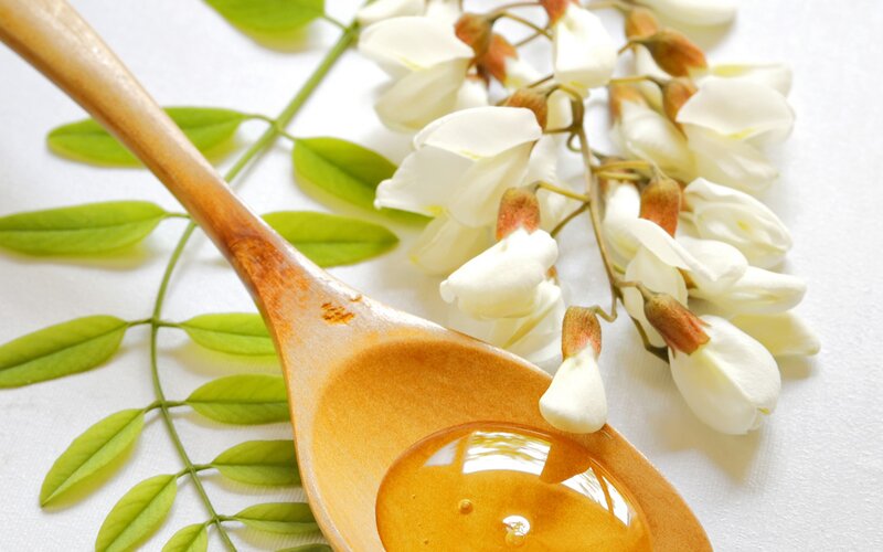 Honey in Wooden Spoon
