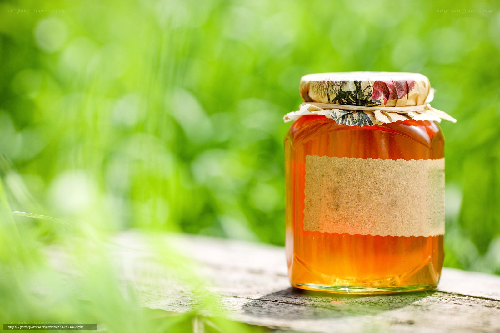 honey jar on wooden table