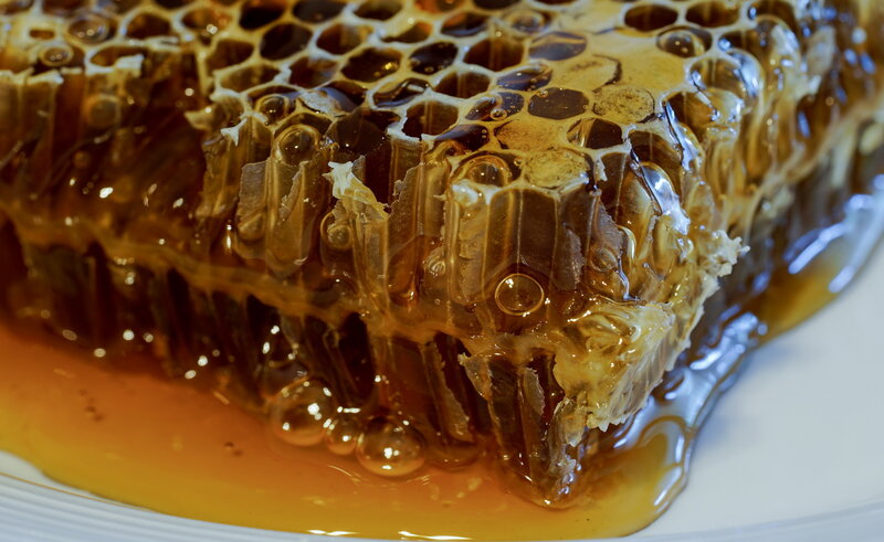 Honeycomb with Dripping Honey — Amber