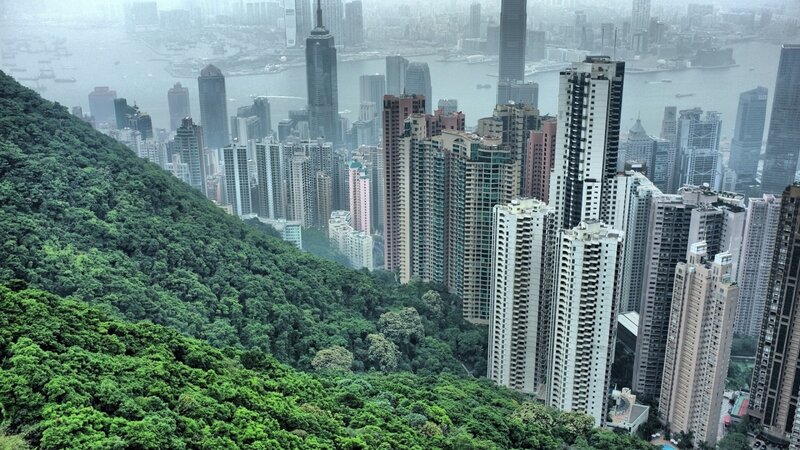 Hong Kong cityscape with green hill
