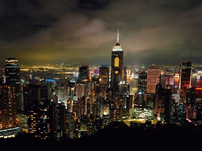 Hong Kong Skyline at Night — Black, Dramatic, Photograph, Skyscrapers, Harbor, Clouds