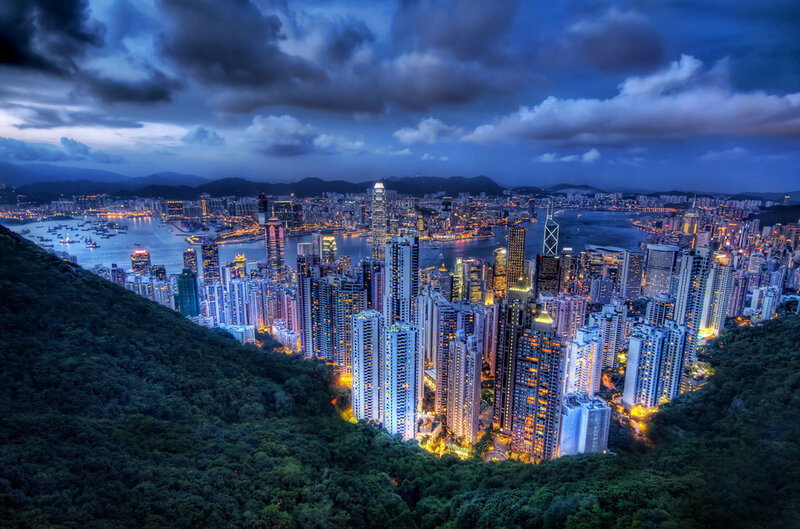 Hong Kong Skyline at Night — Blue, Dramatic, Photograph, Skyscrapers, Harbor, Mountain, Clouds, Black, Yellow