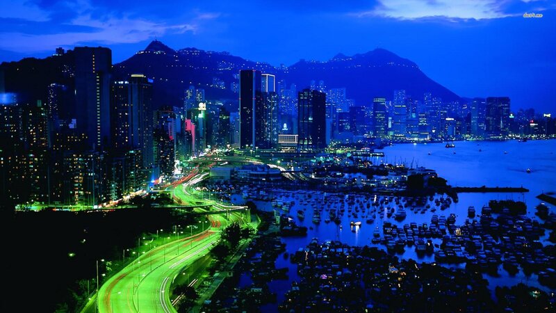 Hong Kong Skyline at Night — Blue, Dramatic, Photograph, Skyscrapers, Harbor, Mountains, Highway