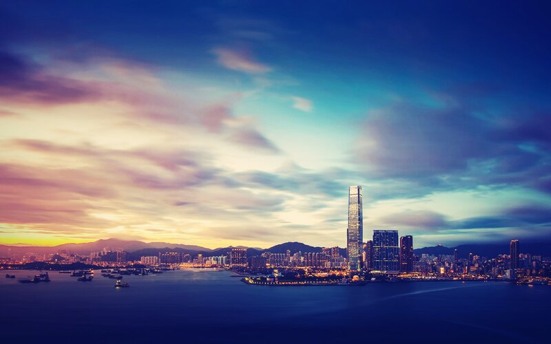 Hong Kong Skyline — Blue, Dramatic, Sunset, Photograph, Skyscrapers, Harbor, Mountains