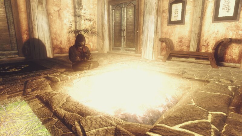 Hooded Figure by Fire