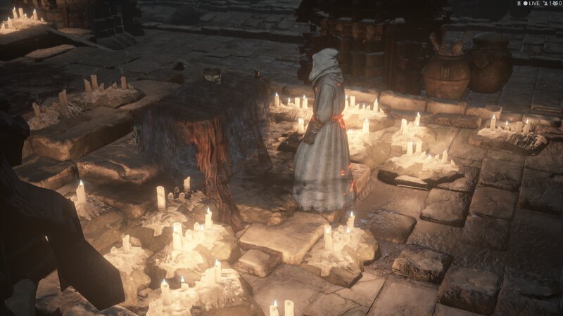 Hooded Figure in Candlelight