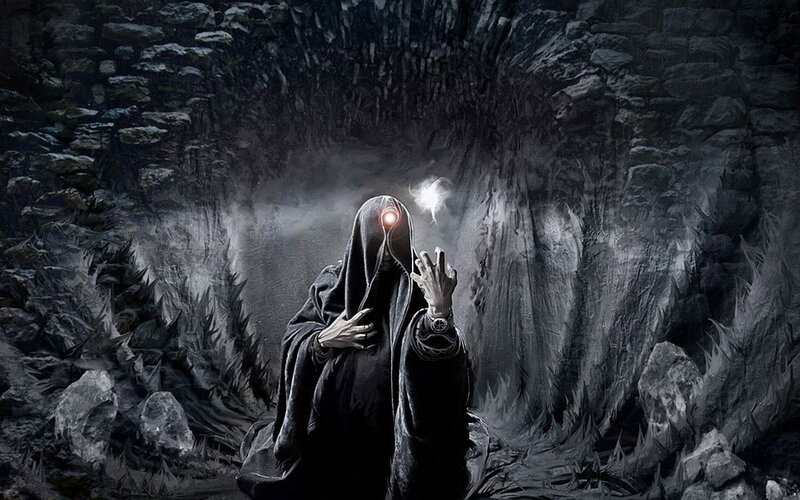 Hooded Figure in Cave