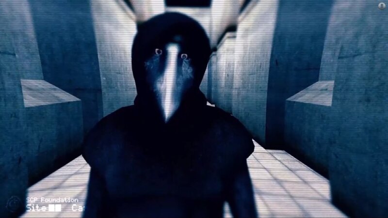 Hooded Figure in Corridor