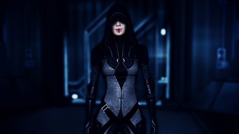 hooded figure in dark corridor
