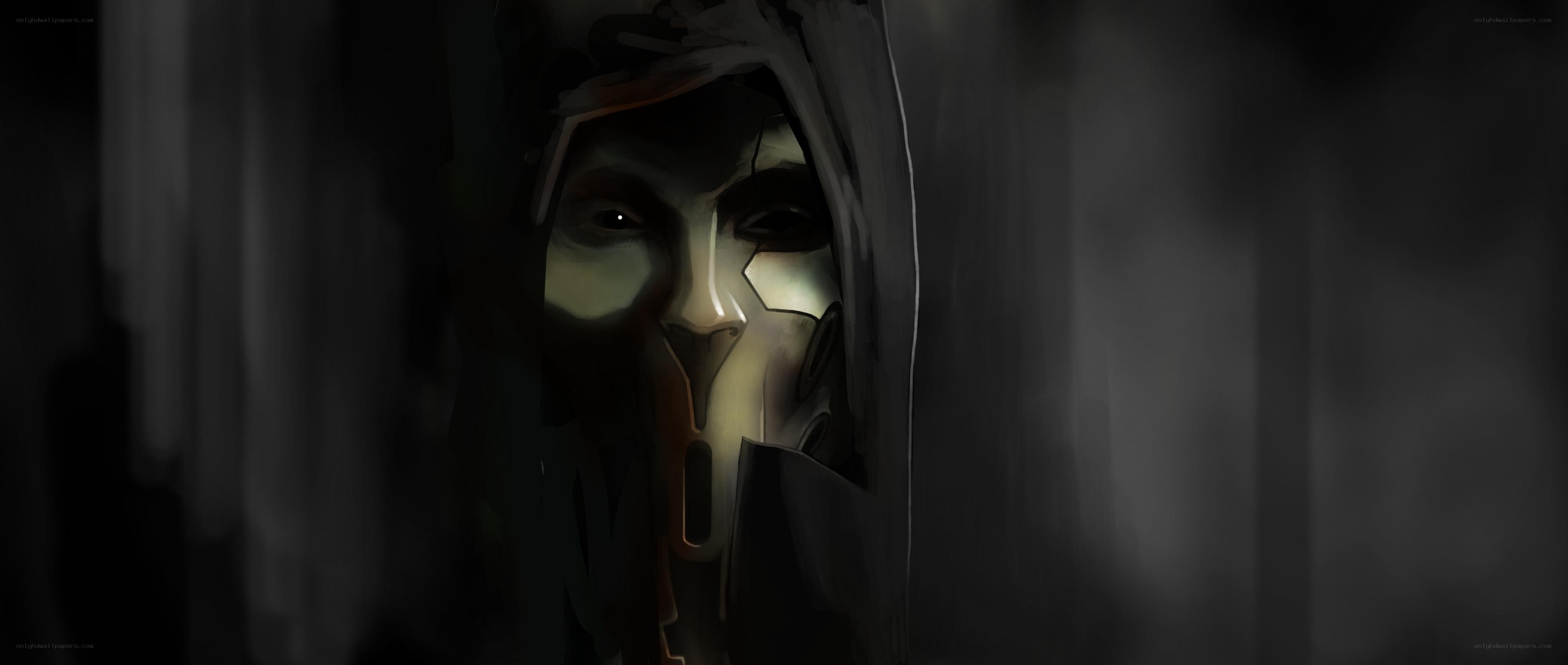 hooded figure in dark corridor