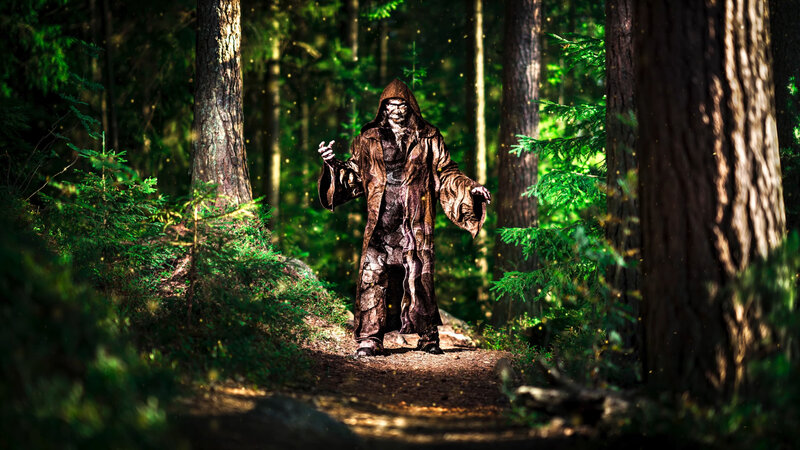 Hooded Figure in Forest — Green, Dramatic