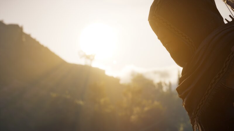 Hooded Figure in Sunset