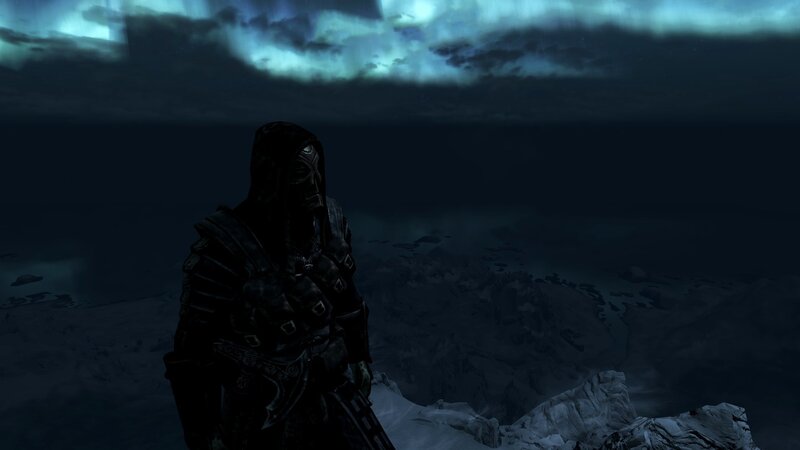Hooded Figure on Mountain